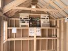 10x16 Cape Cod Storage Shed with shelves built inside from Pine Creek Structures